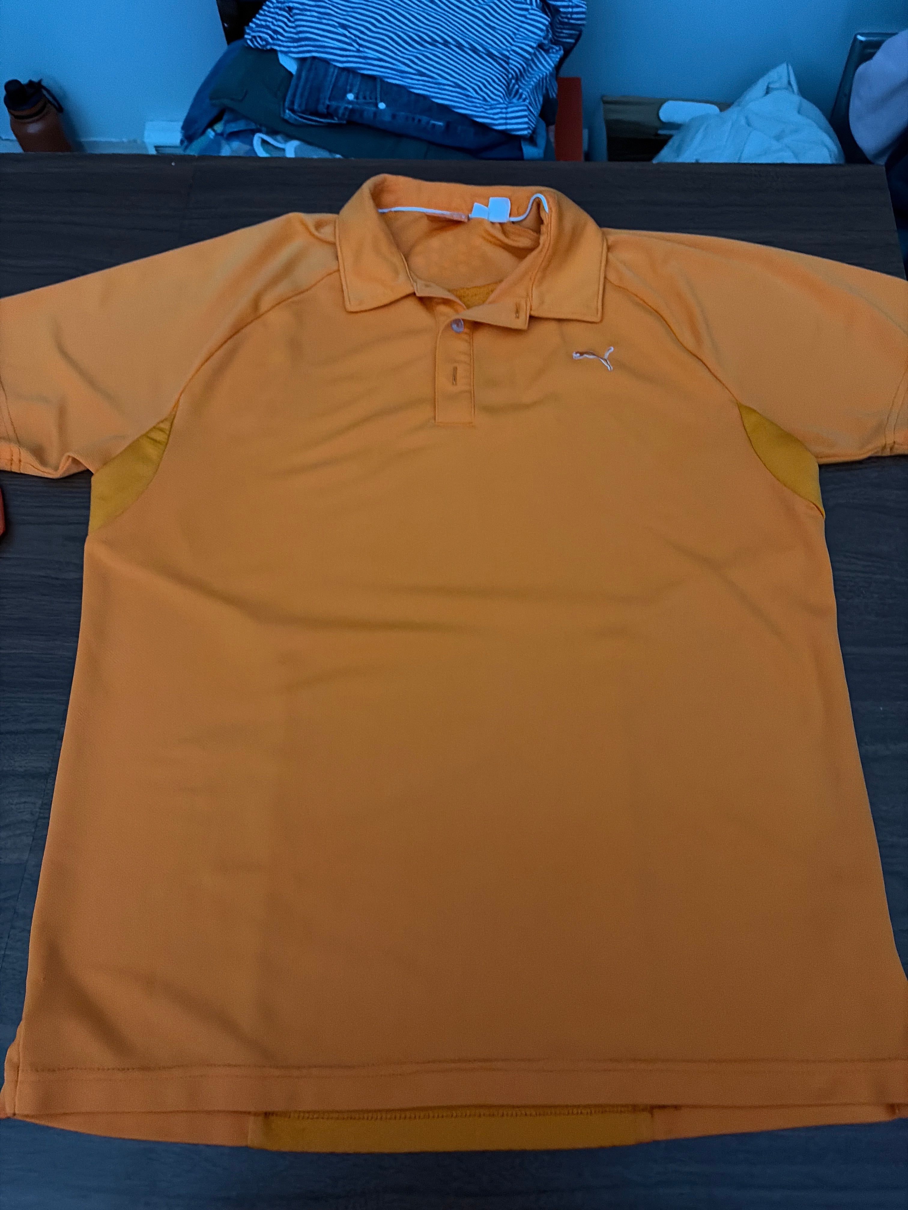 Puma, men’s medium orange golf shirt