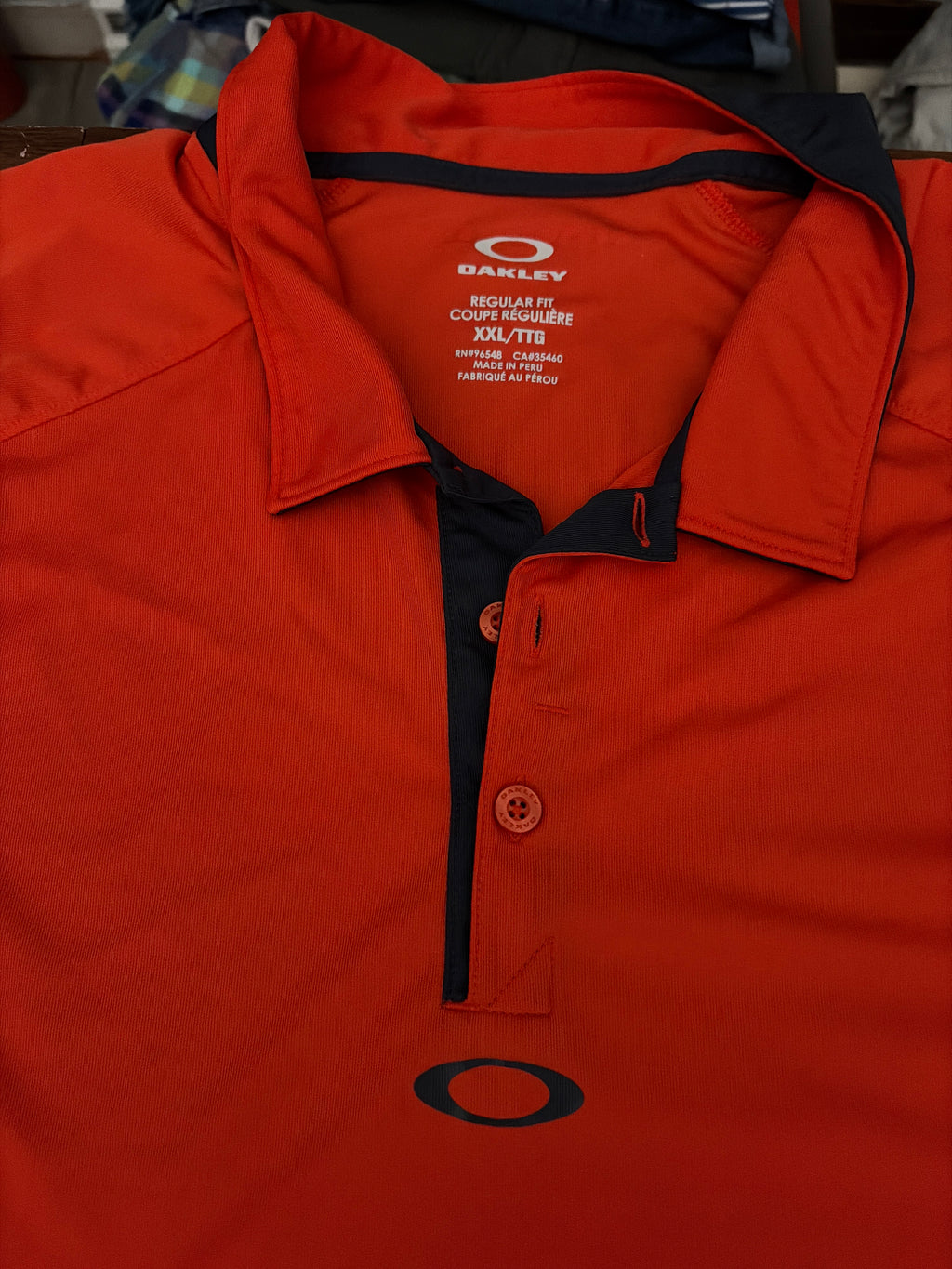 Oakley 2XL men’s orange golf shirt