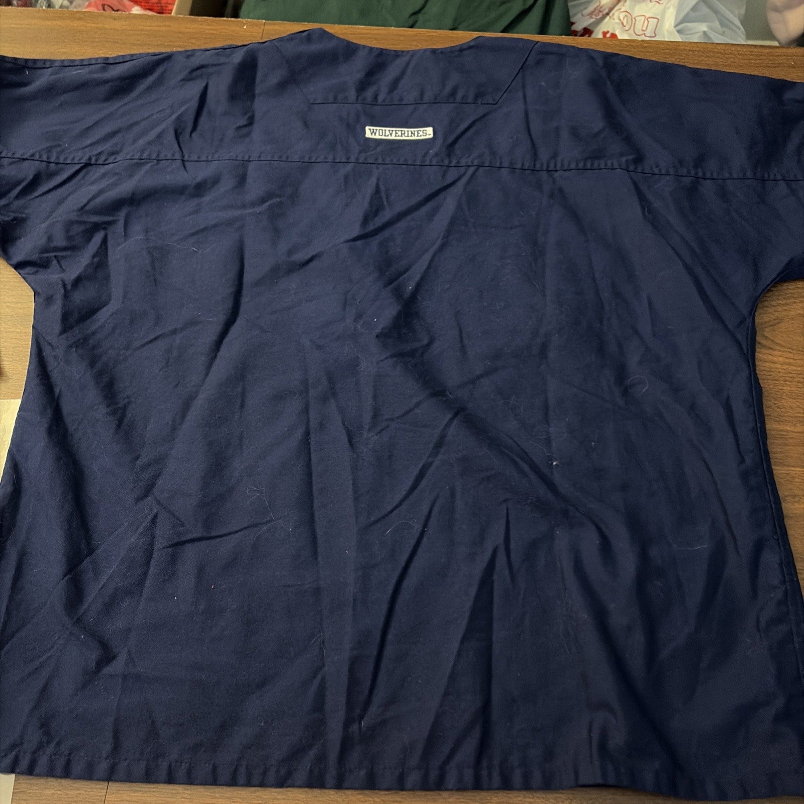 MICHIGAN WOLVERINES SCRUB TOP SIZE 2XL (25x27) LANDAU NAVY BLUE. See Pics