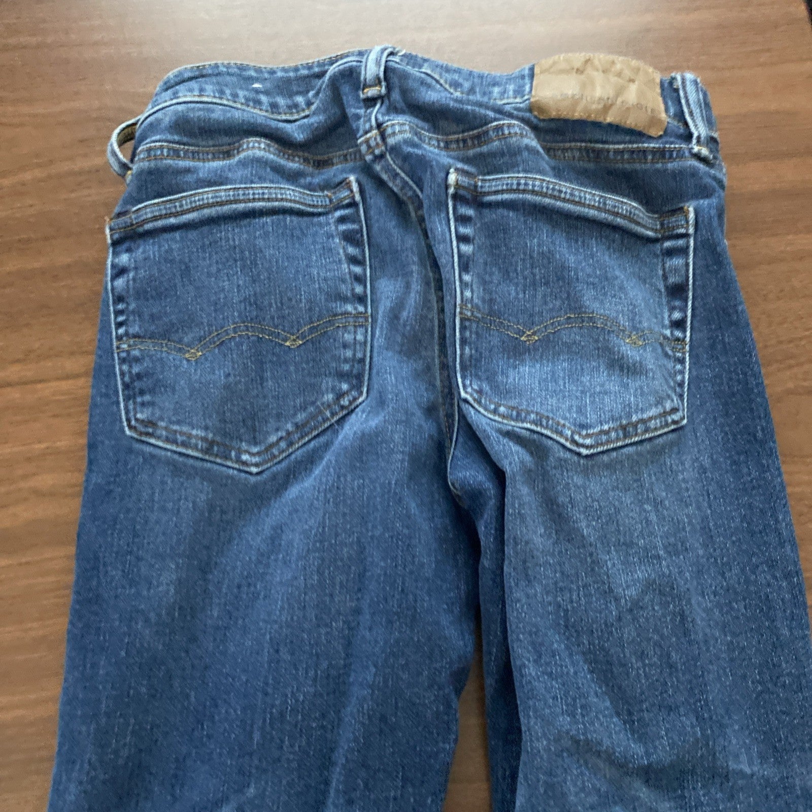 American Eagle next level flex 28X 30 women’s jeans Distressed