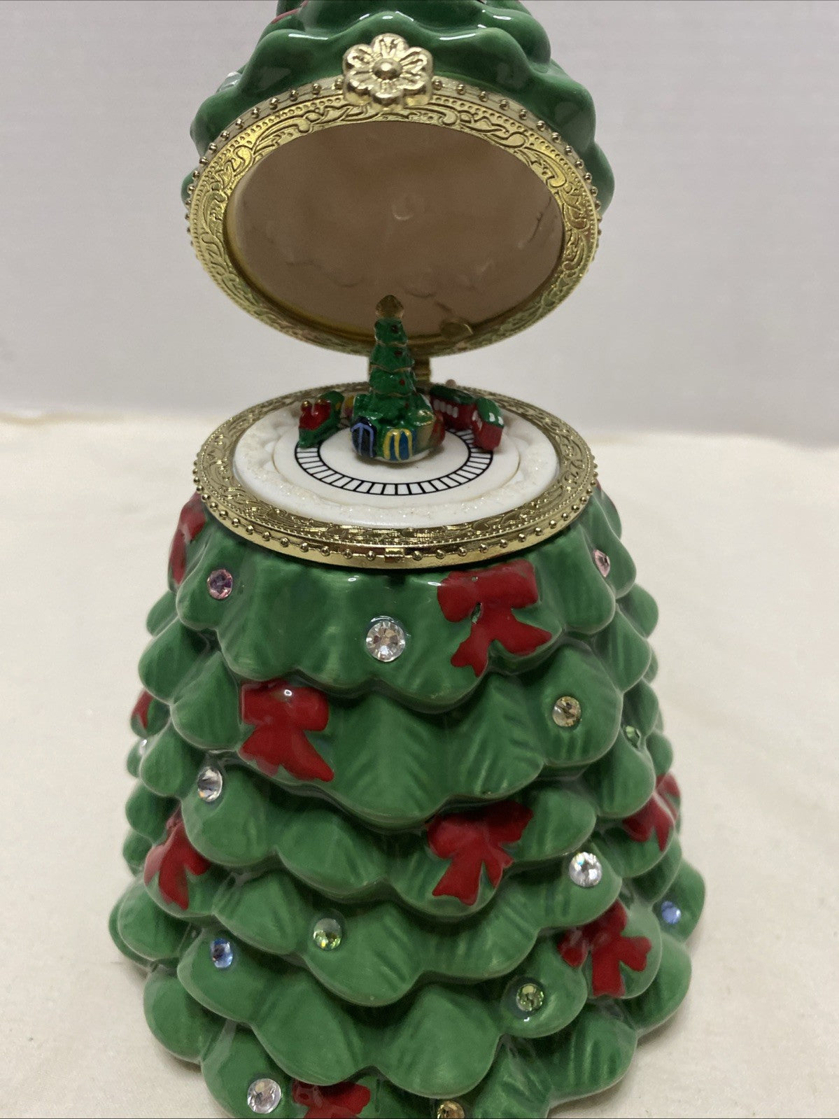 Mr. Christmas Musical Tabletop Ceramic Christmas Tree With Train Inside Top