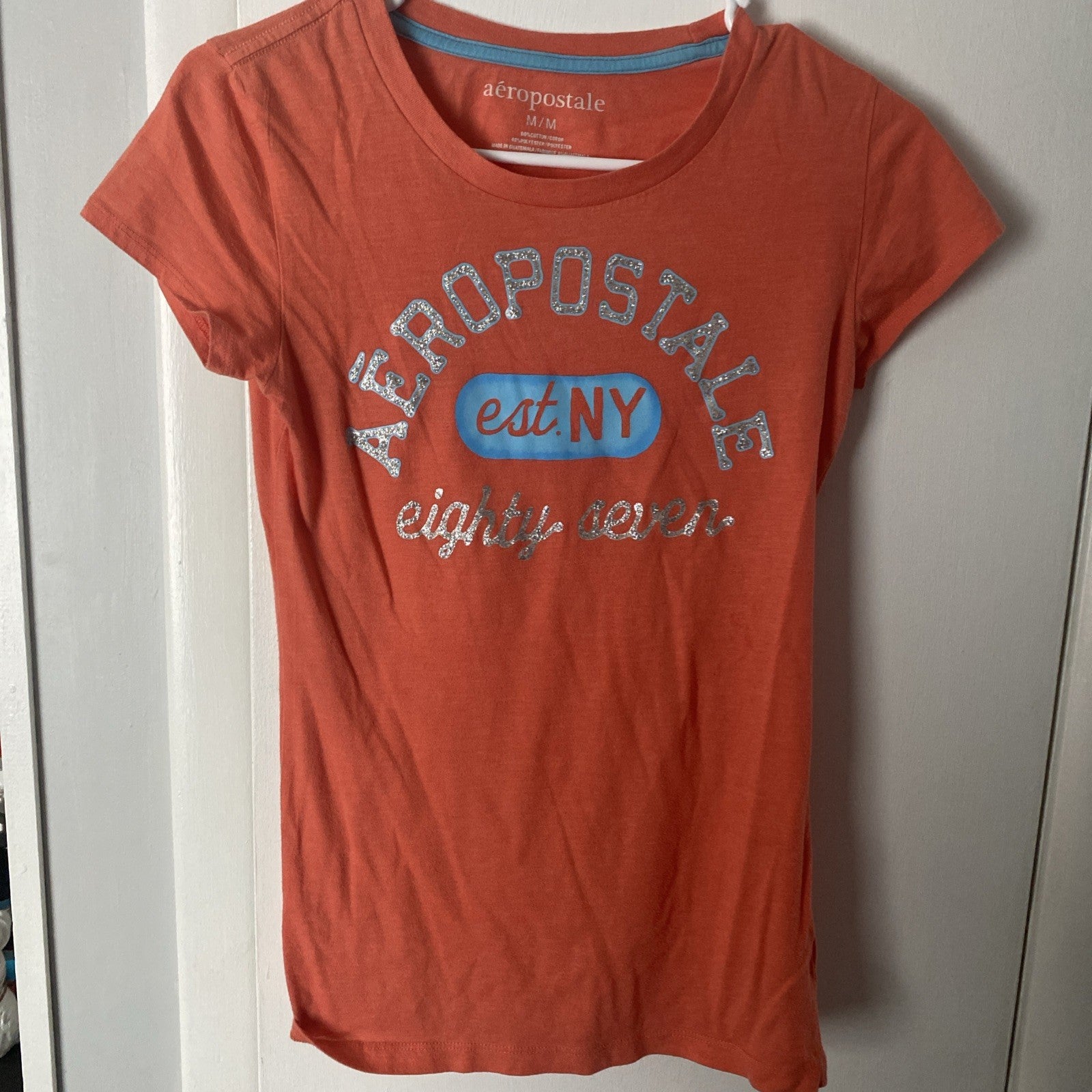 Girls Aeropostale peach Tee Shirt, Size Medium