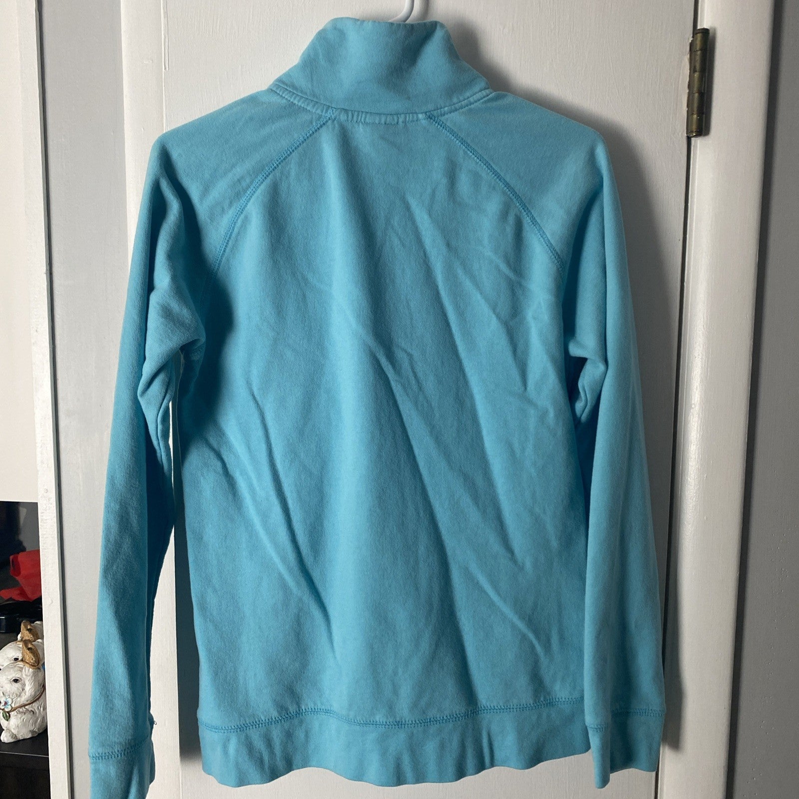 Camp David size medium women’s light blue long sleeve sweat top 1/4 zip