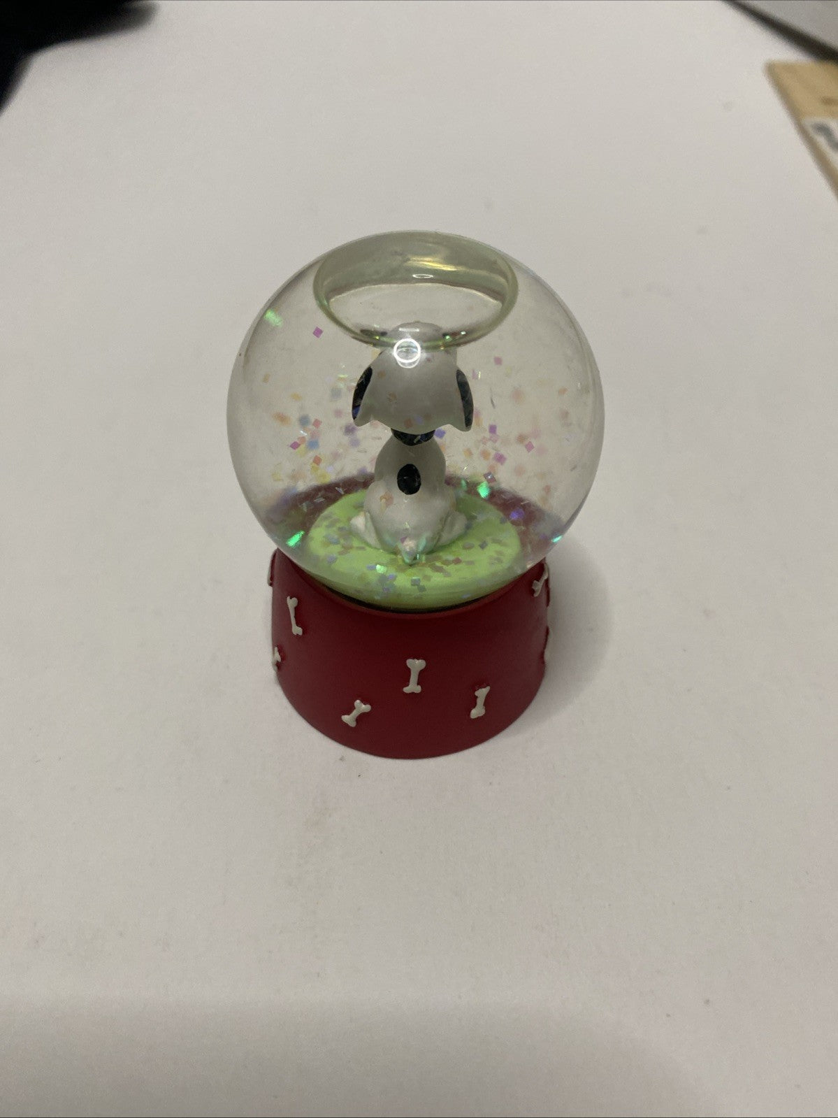 SNOOPY SNOW GLOBE  UNIQUE  RED BASE "SNOOPY" WITH DOG BONES  