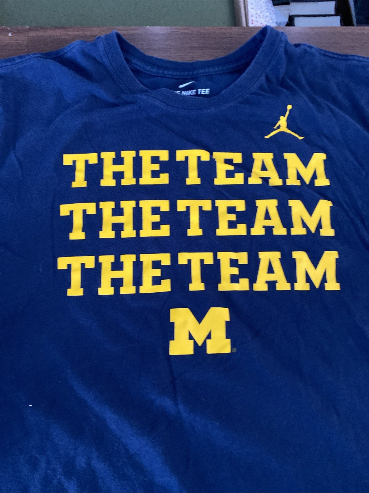 The Nike T extra-large Michigan the team the team the team