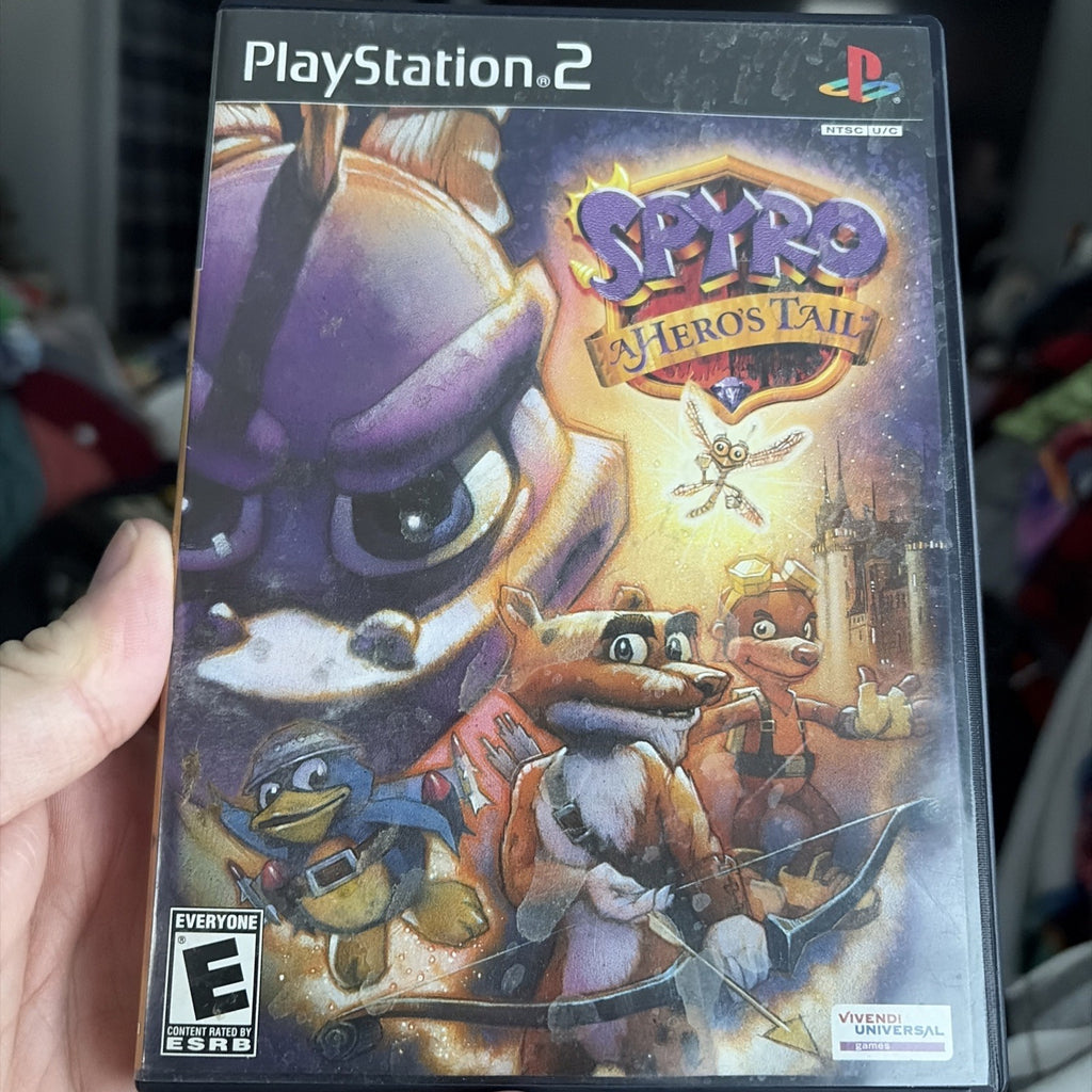 Spyro: A Hero's Tail (Sony PlayStation 2, 2004) Complete with manual.