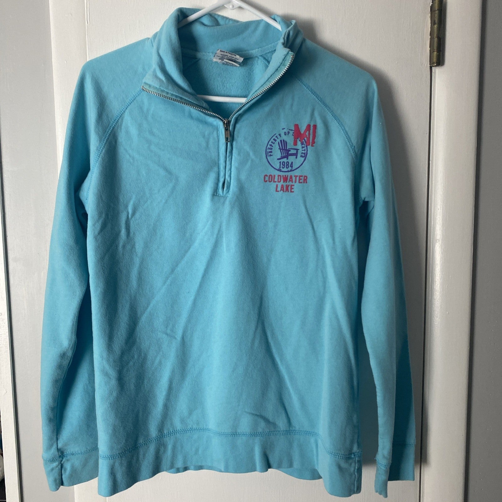 Camp David size medium women’s light blue long sleeve sweat top 1/4 zip