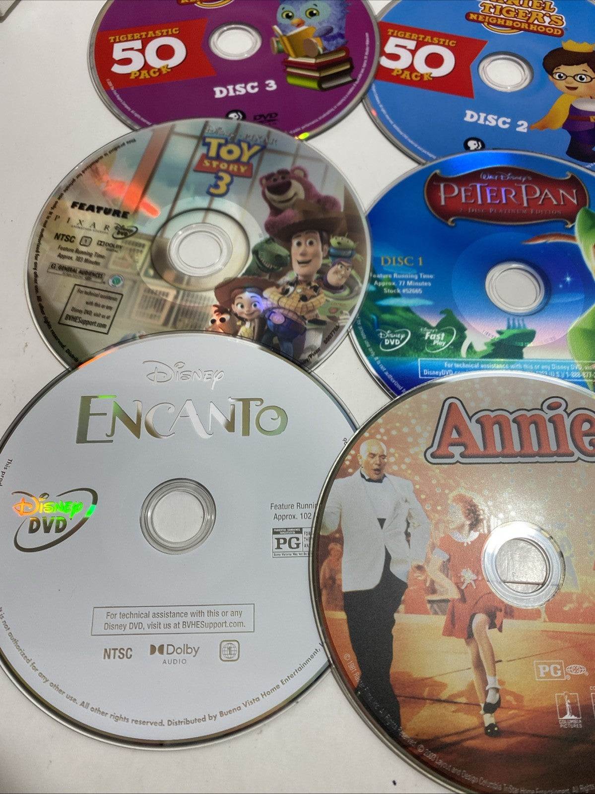 Lot of 20 Disney movie DVDs and sing-along CDs. Please See Photos