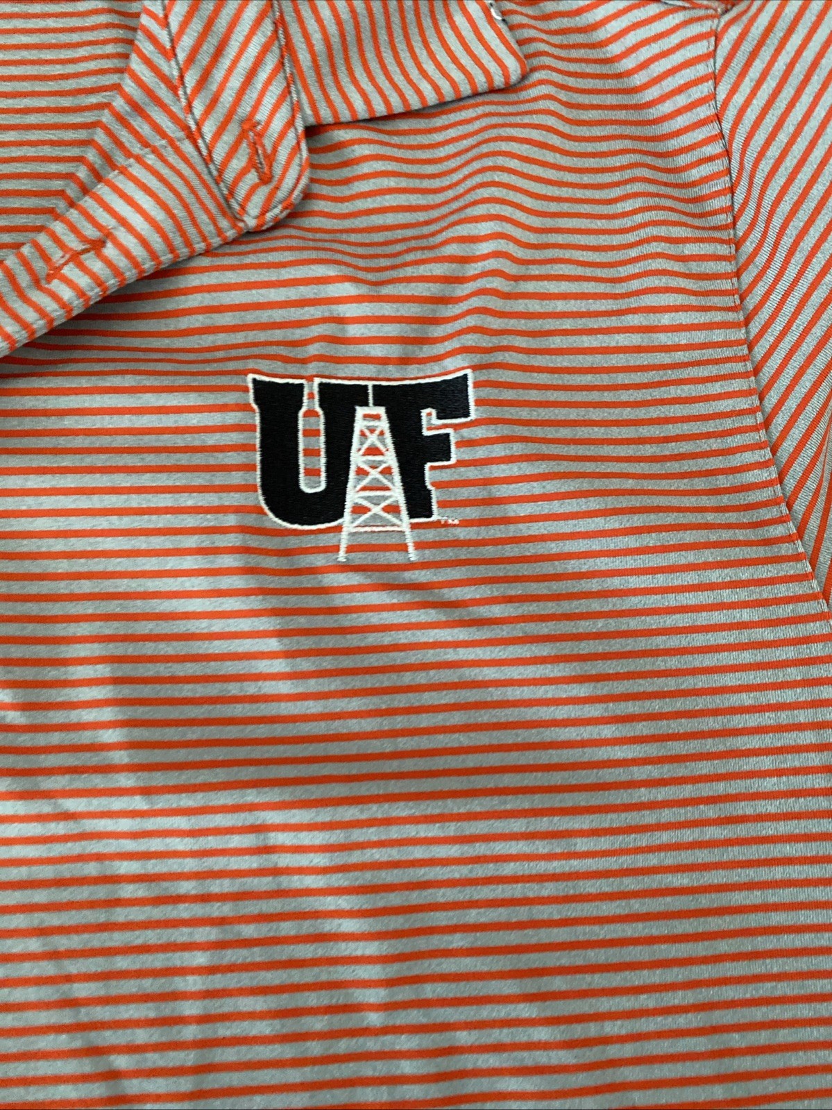 Under Armour men’s loose medium golf polo university of Findlay Oilers