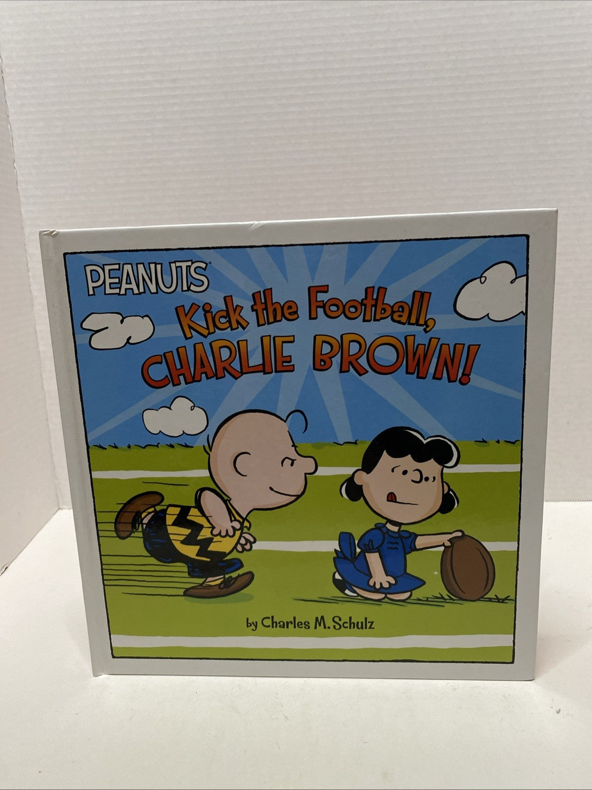 PEANUTS KOHL’S CARES HARDBACK BOOK “KICK THE FOOTBALL, CHARLIE BROWN!” Schulz