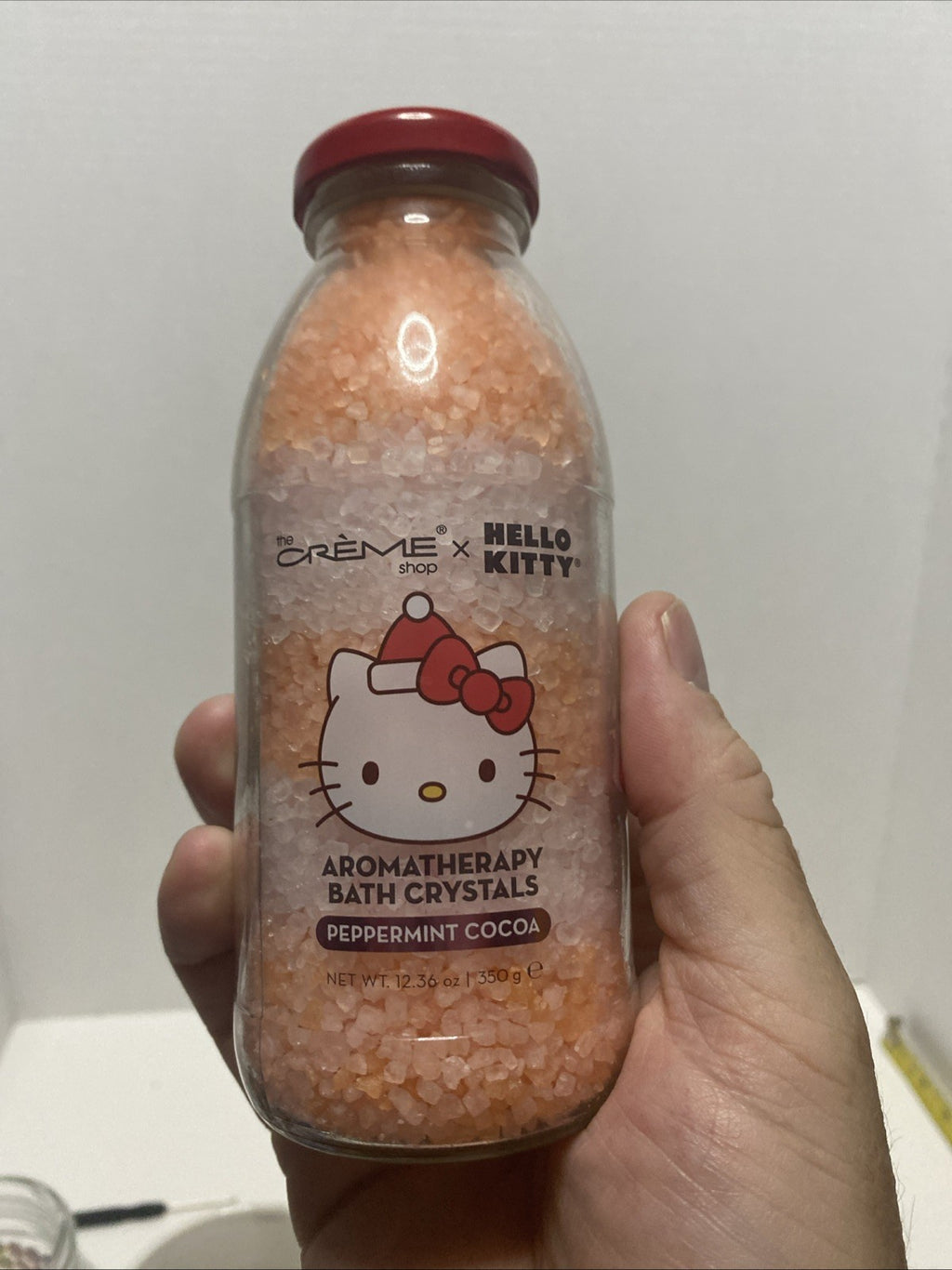 The crème Shop Hello Kitty aromatherapy bath crystals peppermint cocoa 12.36 Oz