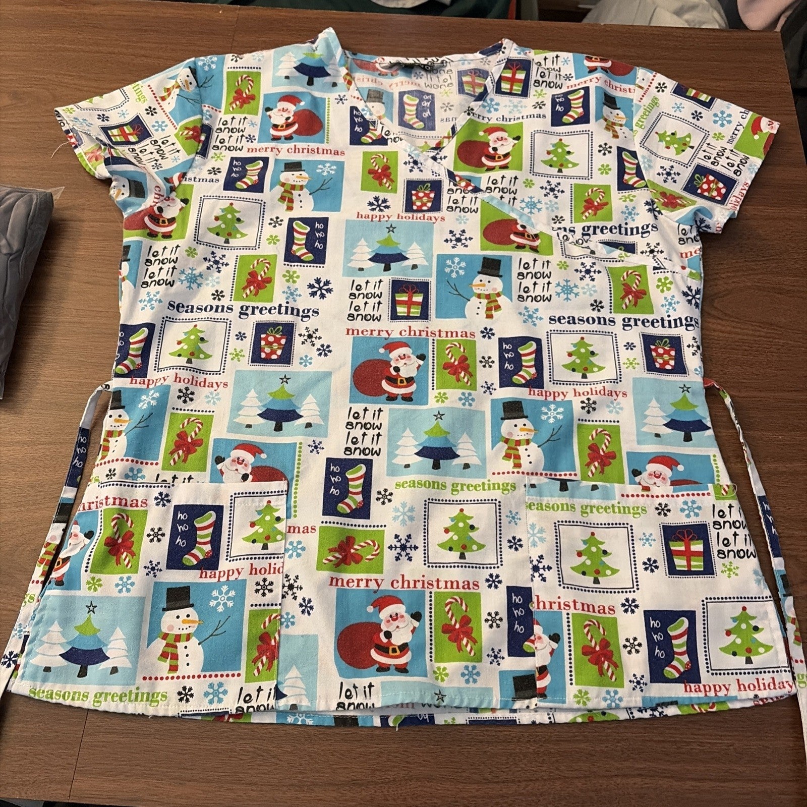 Cassandra O Women’s Size Medium Scrub Top Season Greetings Christmas Pattern