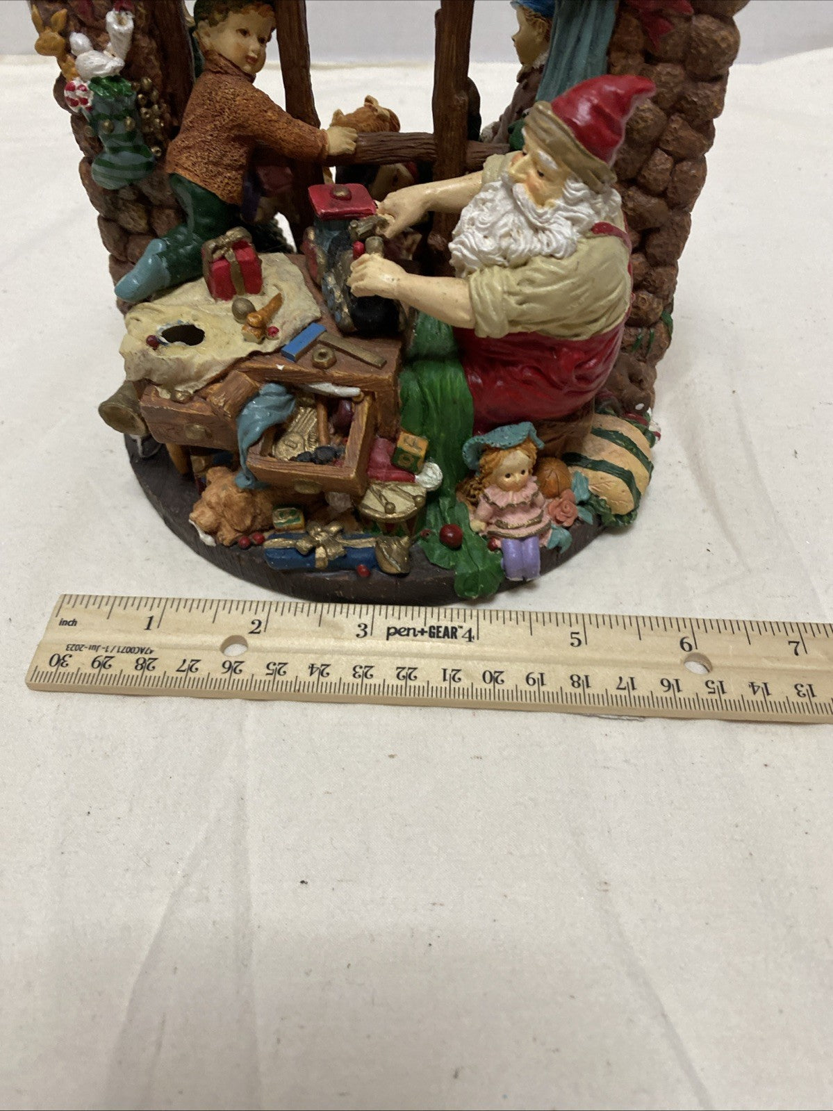 VTG 2-SIDED SANTA’S WORKSHOP CHRISTMAS FIGURE  7”H LOTS OF TOYS & SANTA AT WORK!