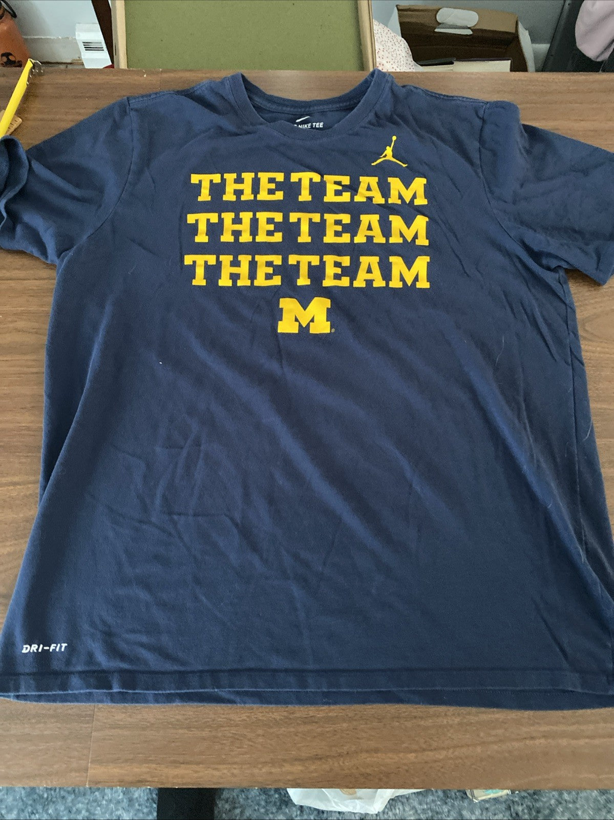 The Nike T extra-large Michigan the team the team the team