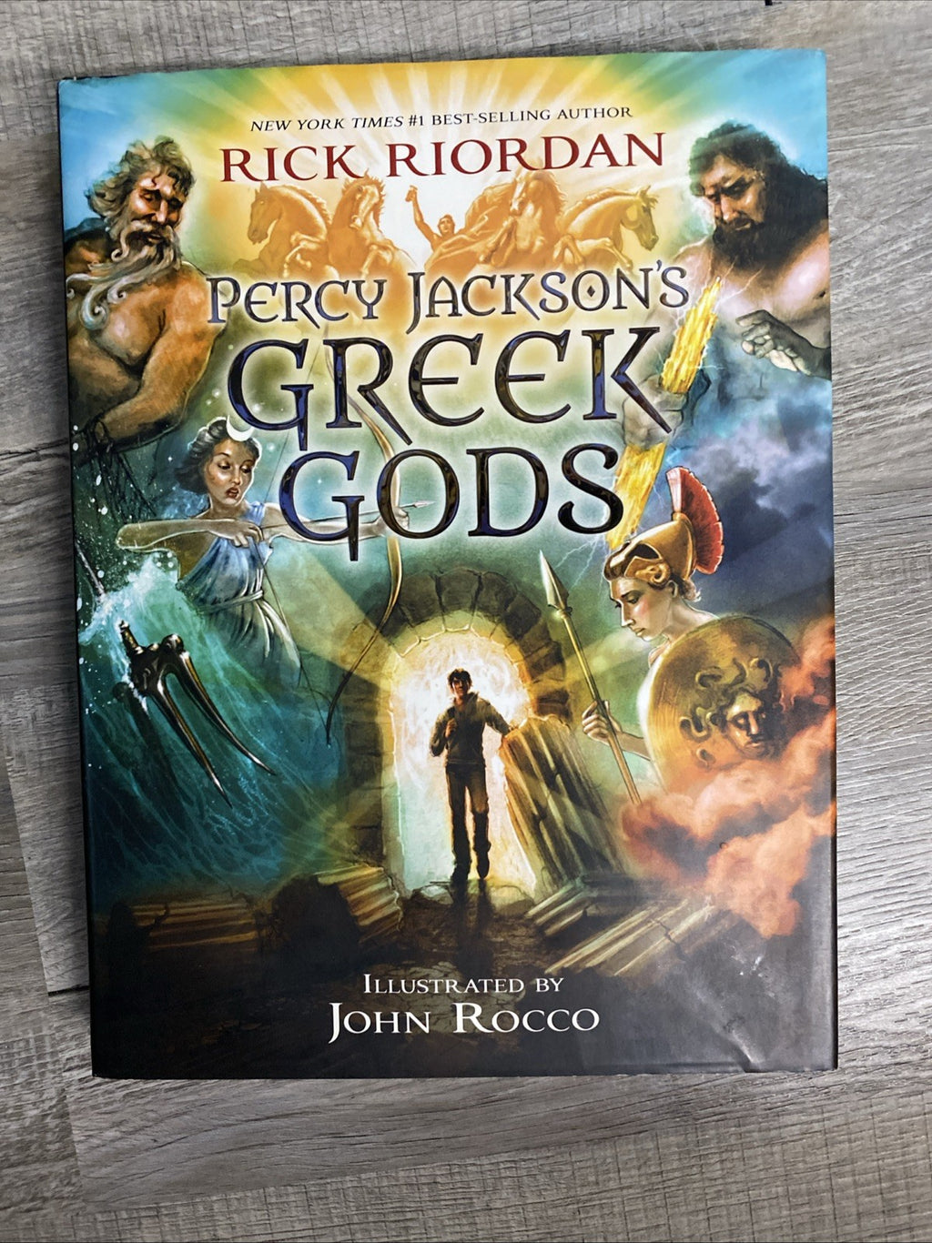 Percy Jackson's Greek Gods by: Rick Riordan - pre-owned - Very good condition