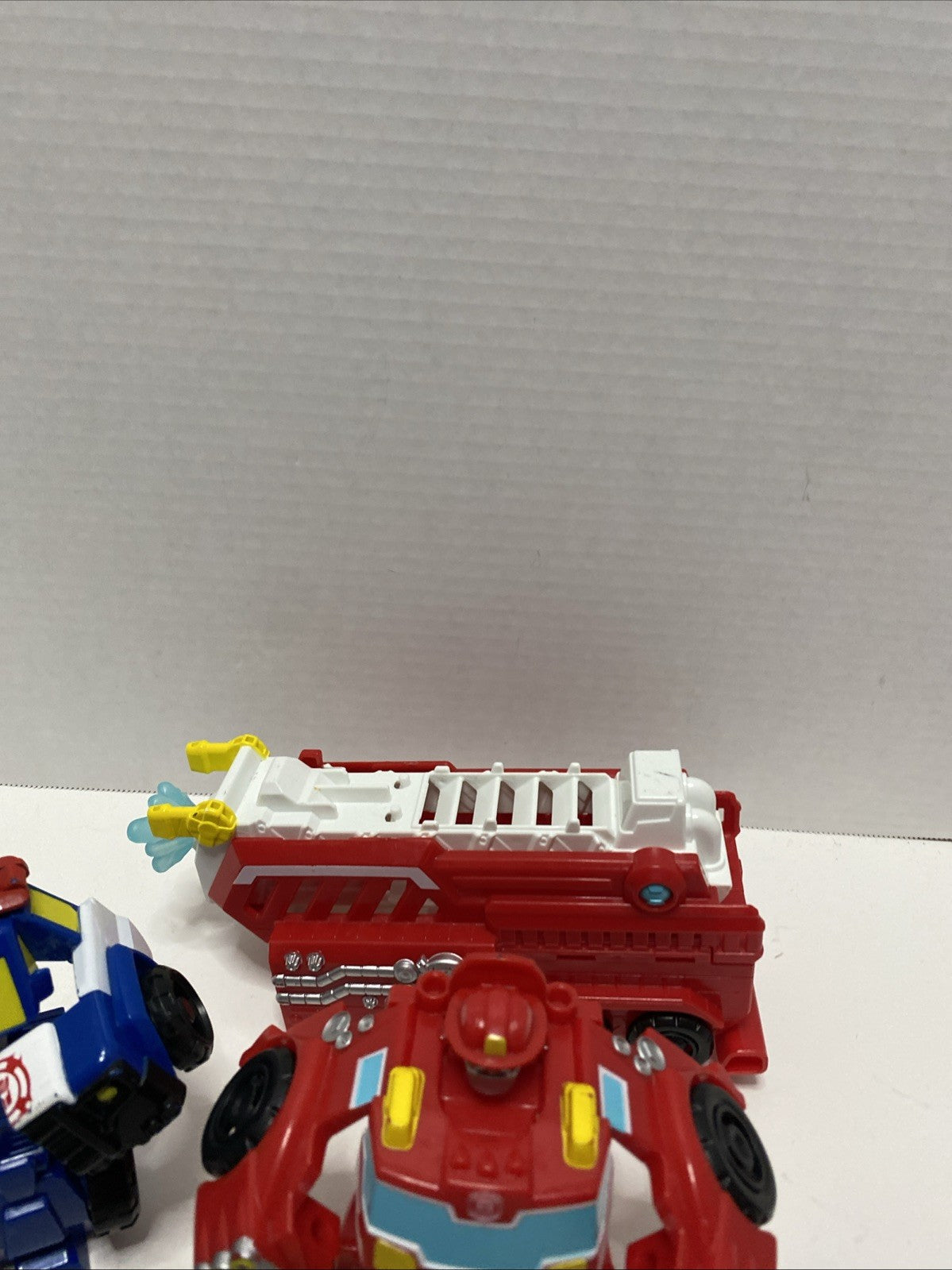 Lot of 4 Hasbro Playskool Heroes Transformers Rescue Bots Figures Optimus Prime