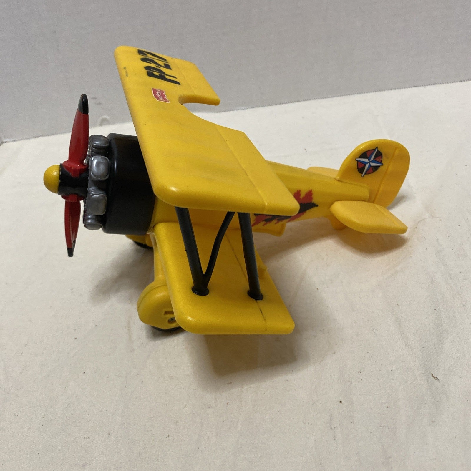 2006 Fisher Price Imaginext 8.5” Yellow BiPlane- Propeller Spins