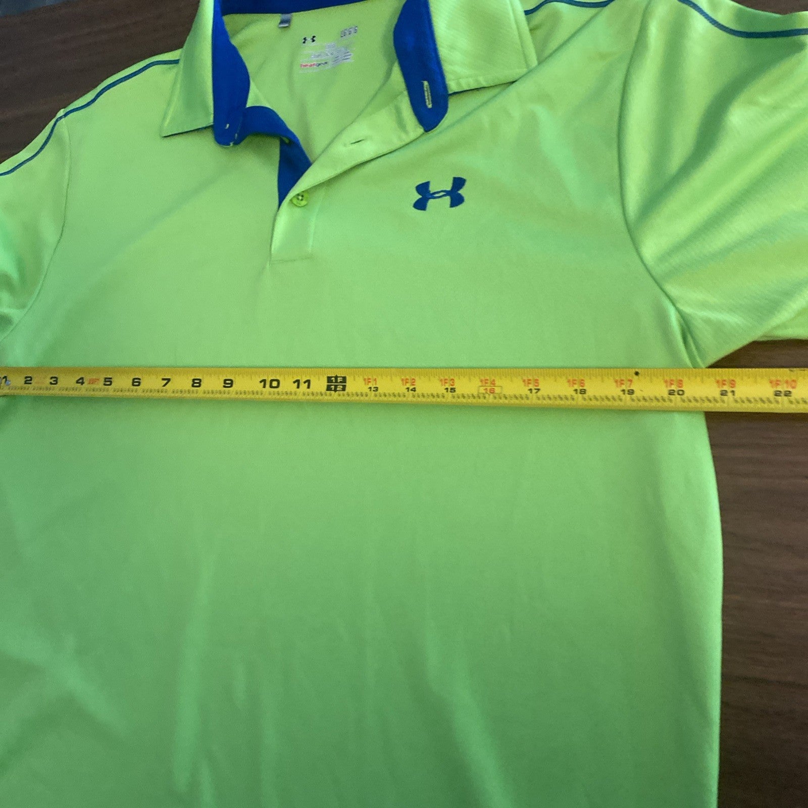 Under Armour heat gear size large men’s polo short sleeve shirt lime green