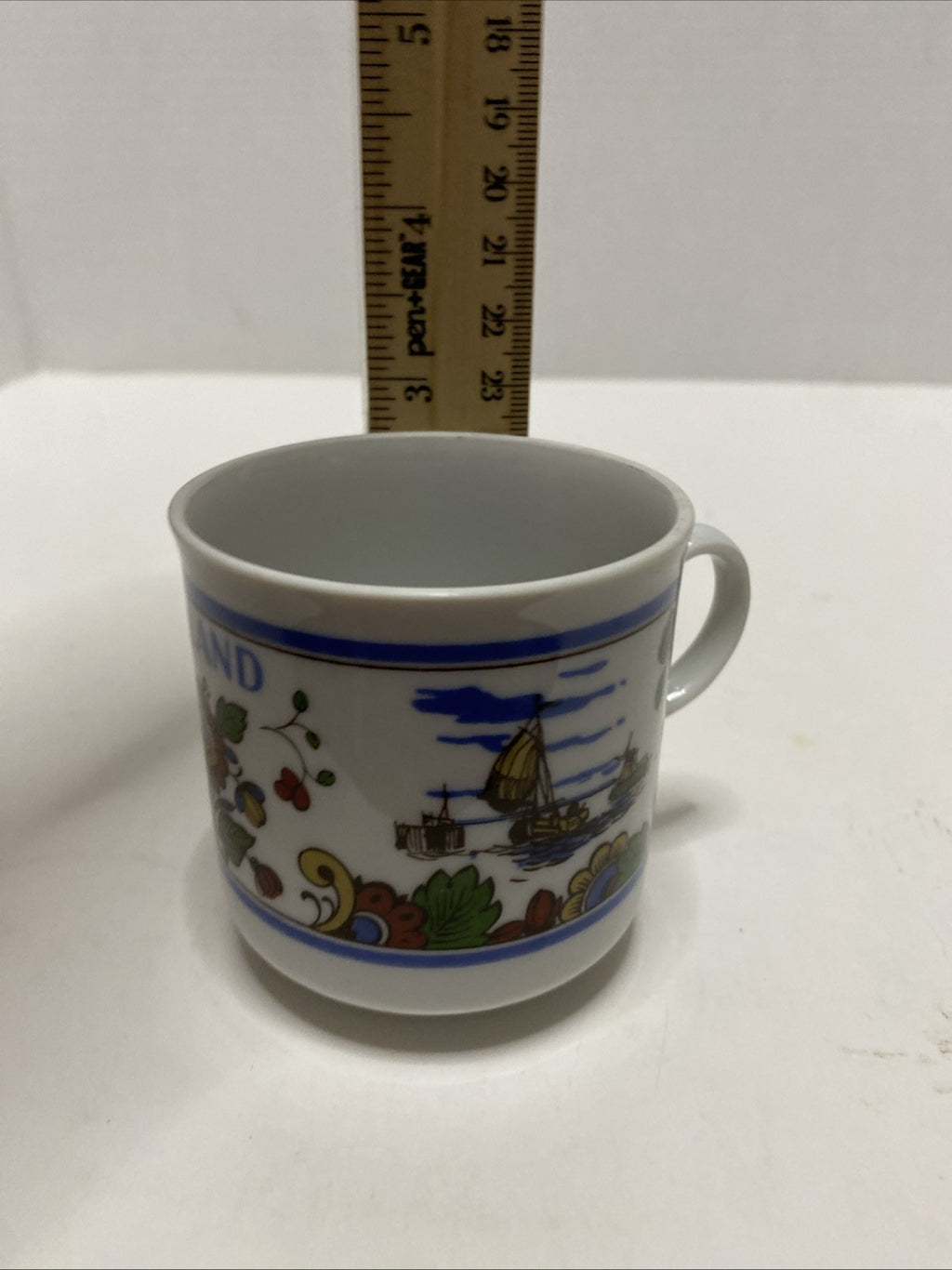 Delft IS colorful hand painted earthenware coffee mug Holland Netherlands 