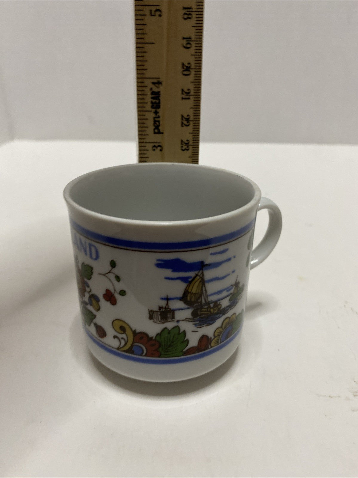 Delft IS colorful hand painted earthenware coffee mug Holland Netherlands 