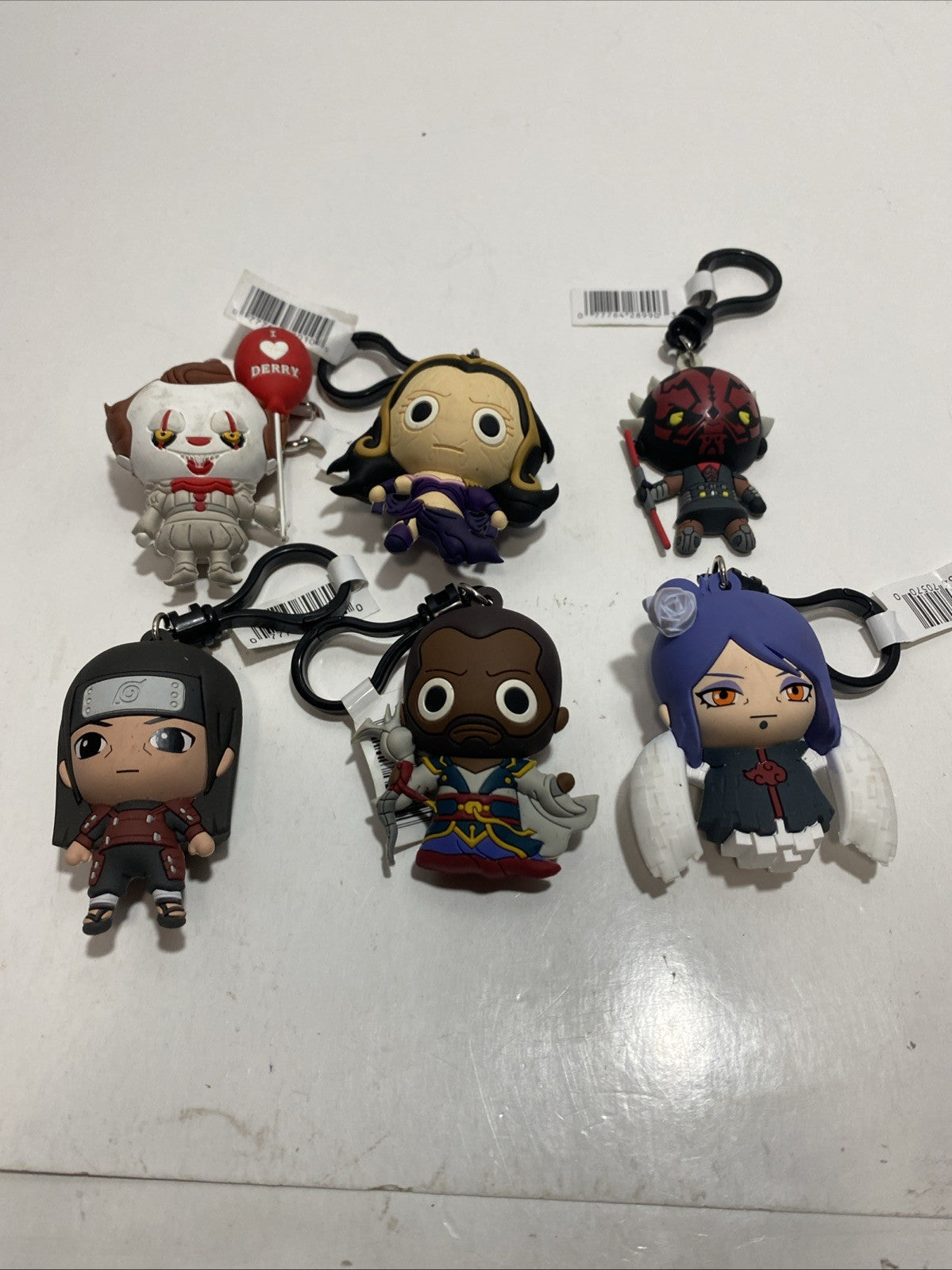 Lot of six keychain clips Pennywise, Darth Maul, please see pictures