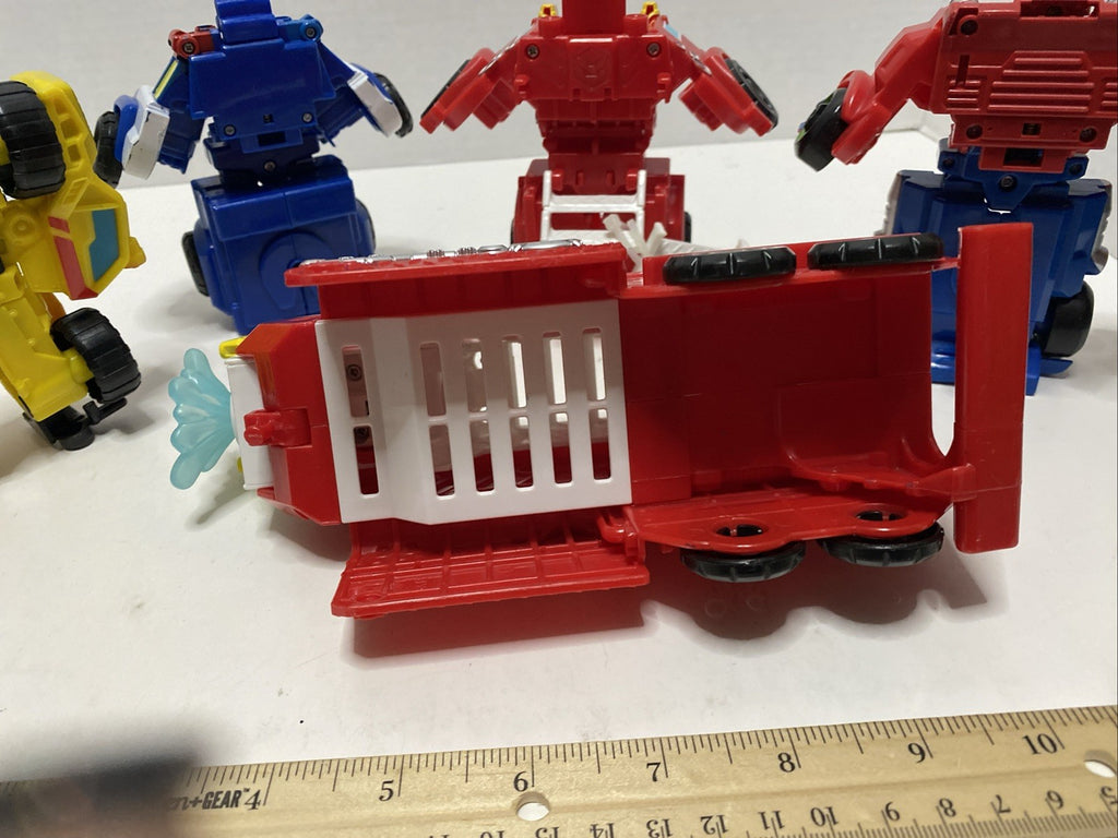 Lot of 4 Hasbro Playskool Heroes Transformers Rescue Bots Figures Optimus Prime
