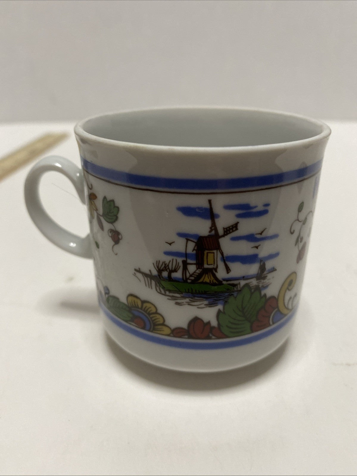 Delft IS colorful hand painted earthenware coffee mug Holland Netherlands 