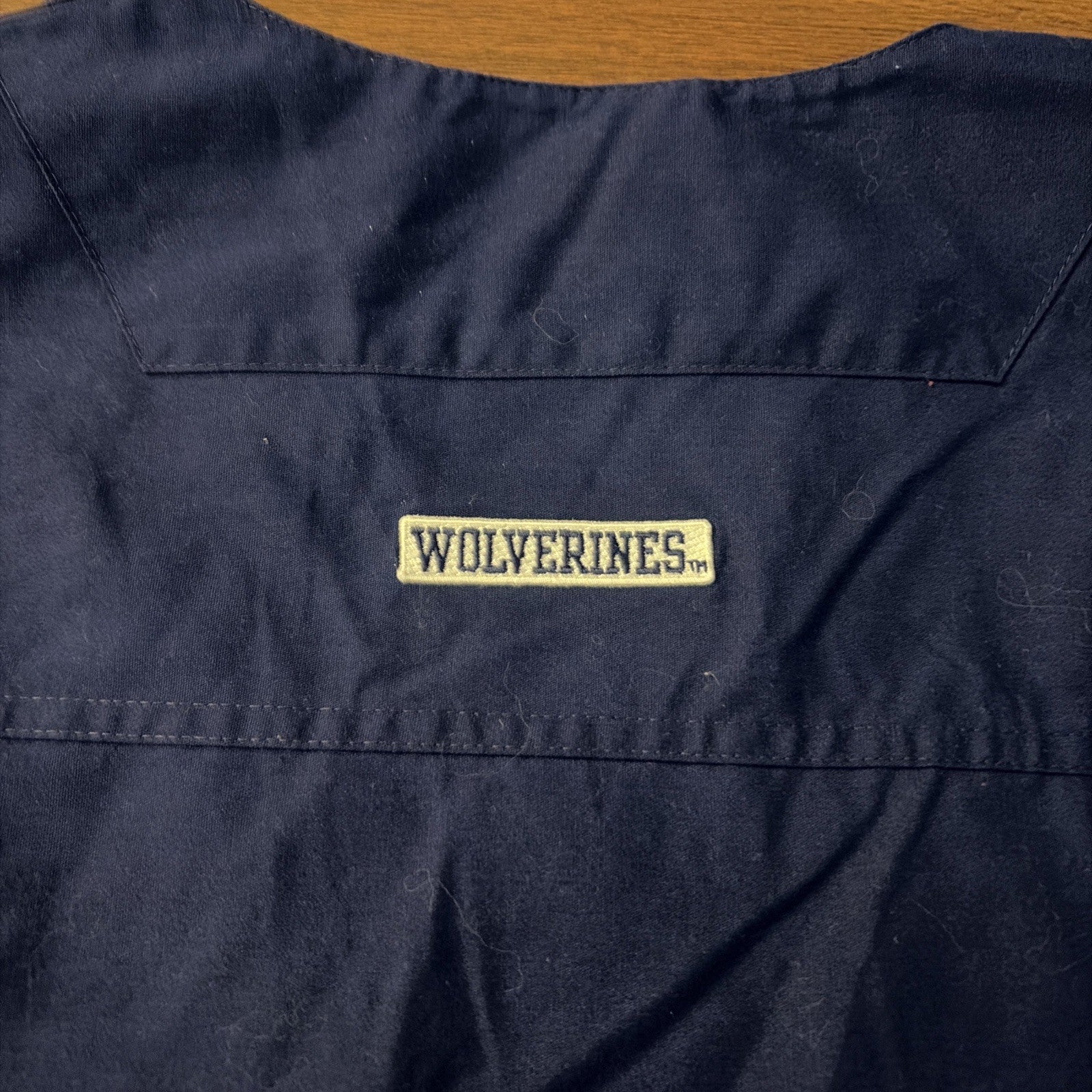MICHIGAN WOLVERINES SCRUB TOP SIZE 2XL (25x27) LANDAU NAVY BLUE. See Pics