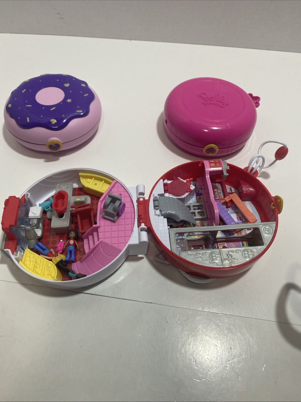 Lot Of Three Polly Pockets Cases Dolls And Accessories