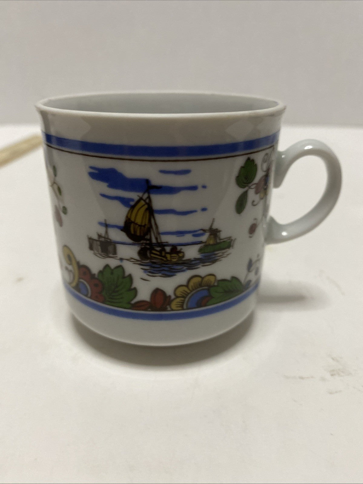 Delft IS colorful hand painted earthenware coffee mug Holland Netherlands 