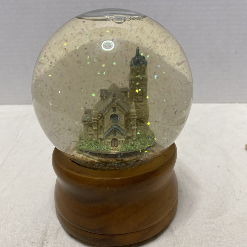 Snow globe Church Plays “Oh Holy Night”