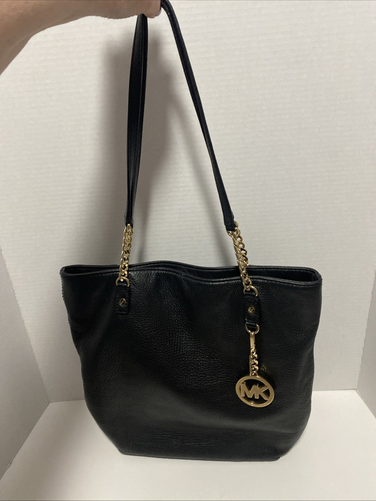 Michael Kors Black Pebbled Leather Handbag Purse Gold Medallion MK Chain EUC