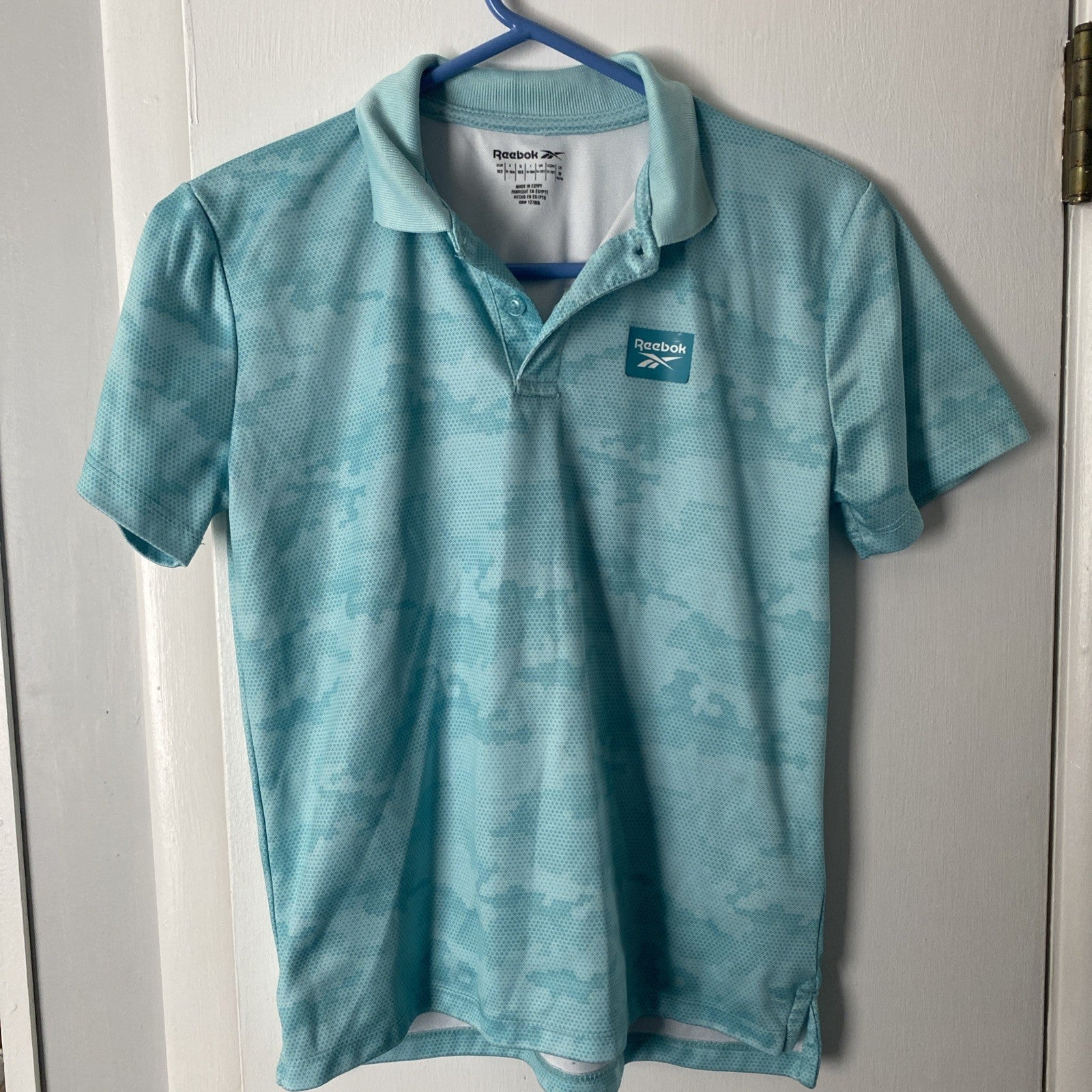 Reebok women’s size medium polo teal 1/4 button short sleeve