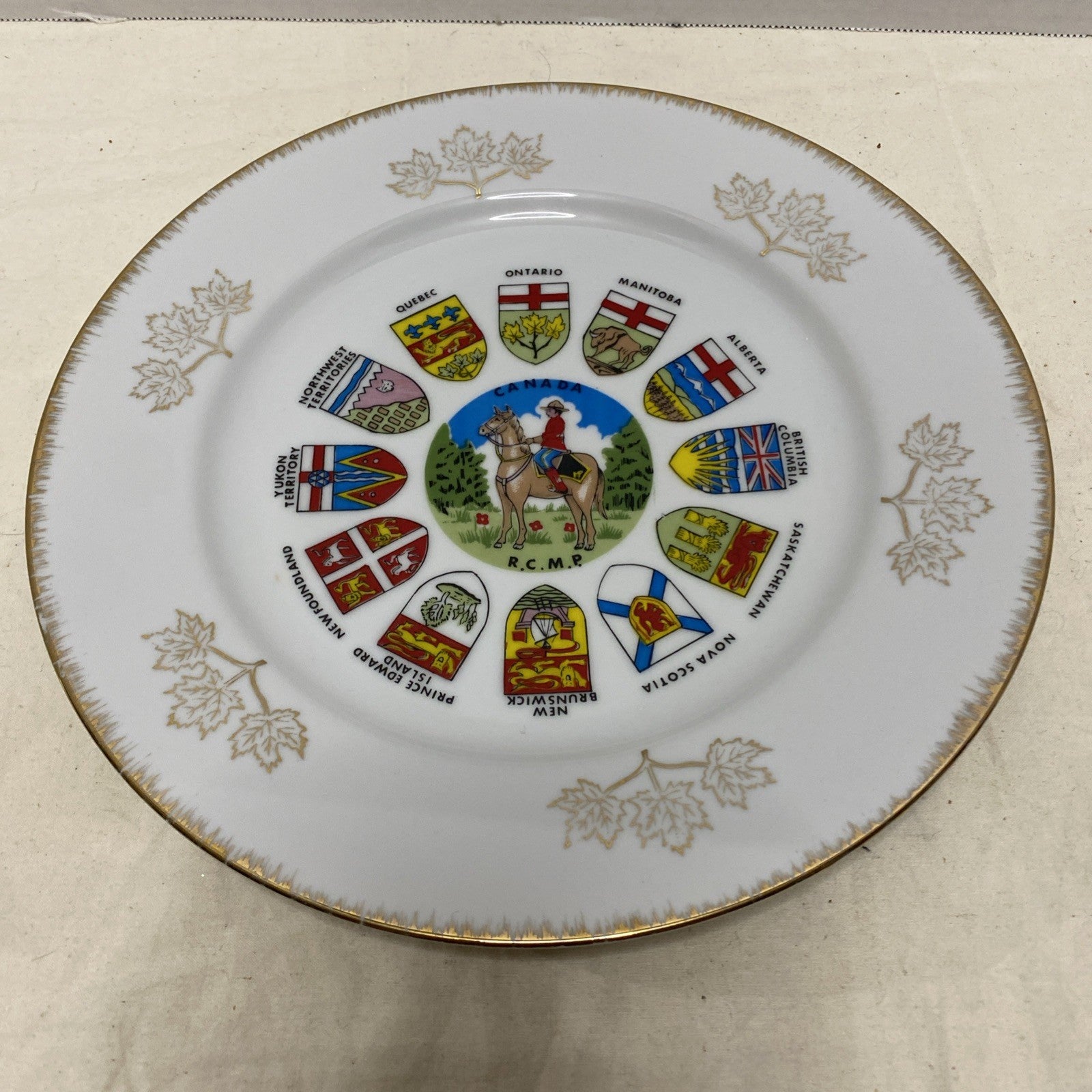 Vintage RCMP hand painted plate Souvenir of Canada Beautiful