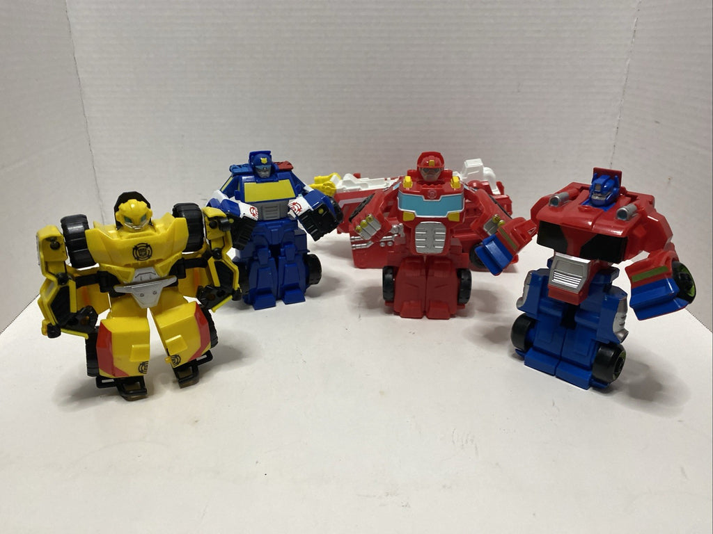Lot of 4 Hasbro Playskool Heroes Transformers Rescue Bots Figures Optimus Prime