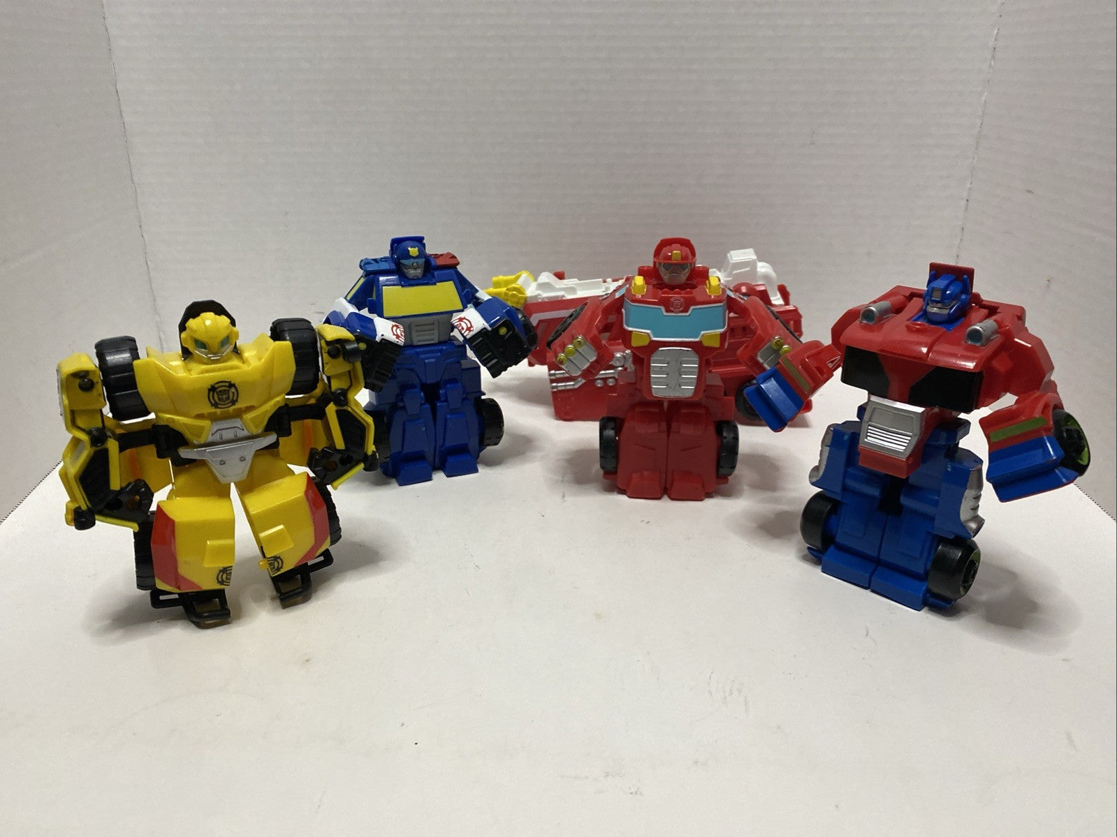 Lot of 4 Hasbro Playskool Heroes Transformers Rescue Bots Figures Optimus Prime