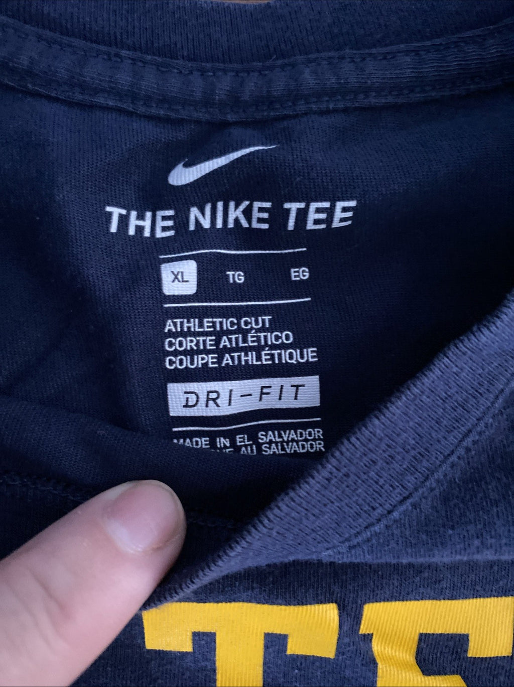 The Nike T extra-large Michigan the team the team the team