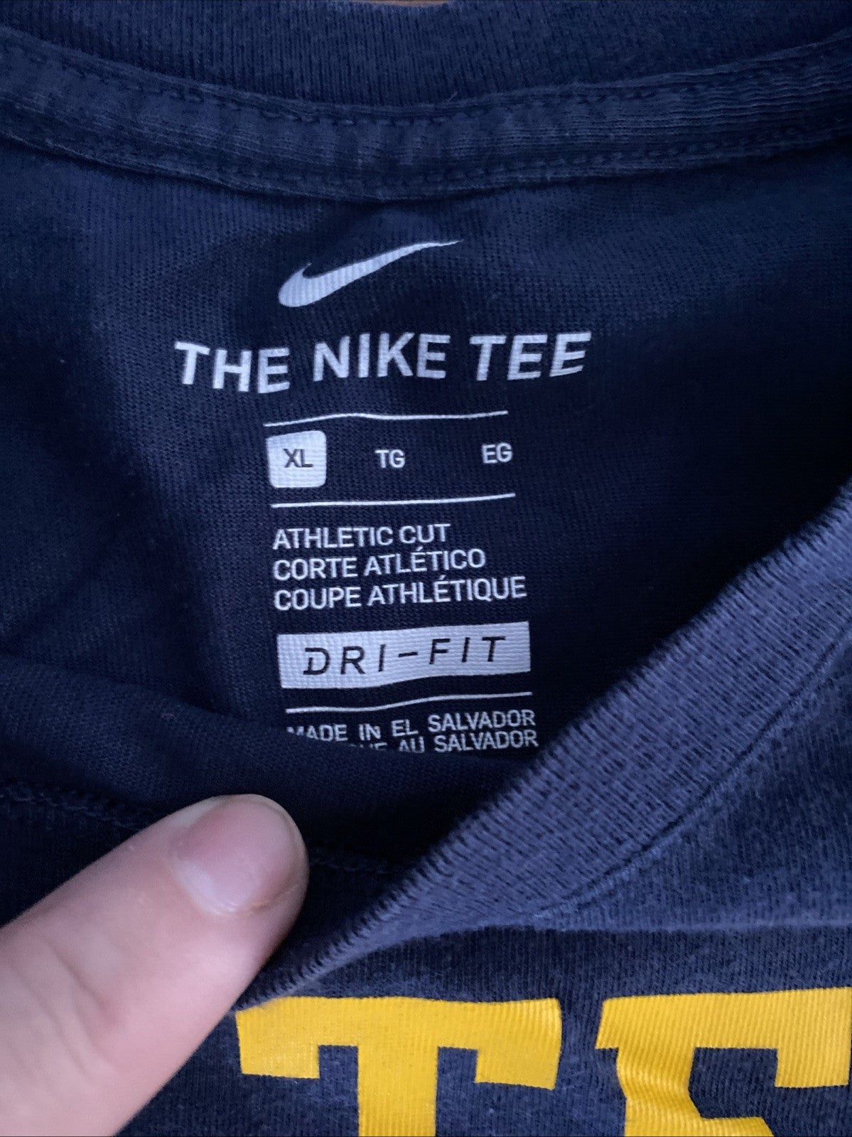 The Nike T extra-large Michigan the team the team the team