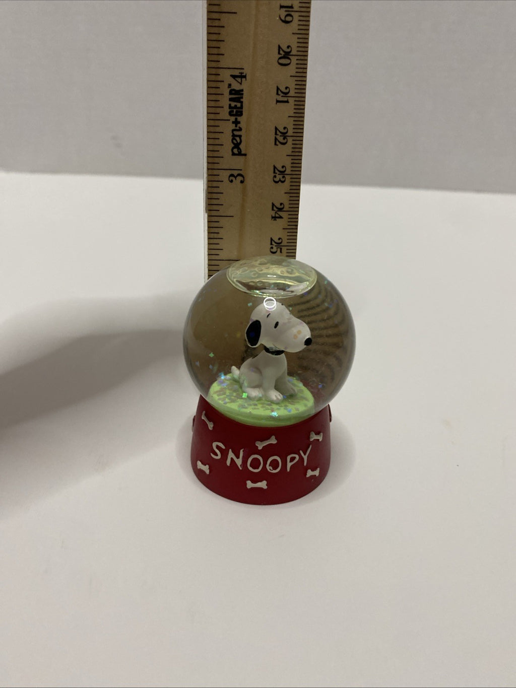 SNOOPY SNOW GLOBE  UNIQUE  RED BASE "SNOOPY" WITH DOG BONES  