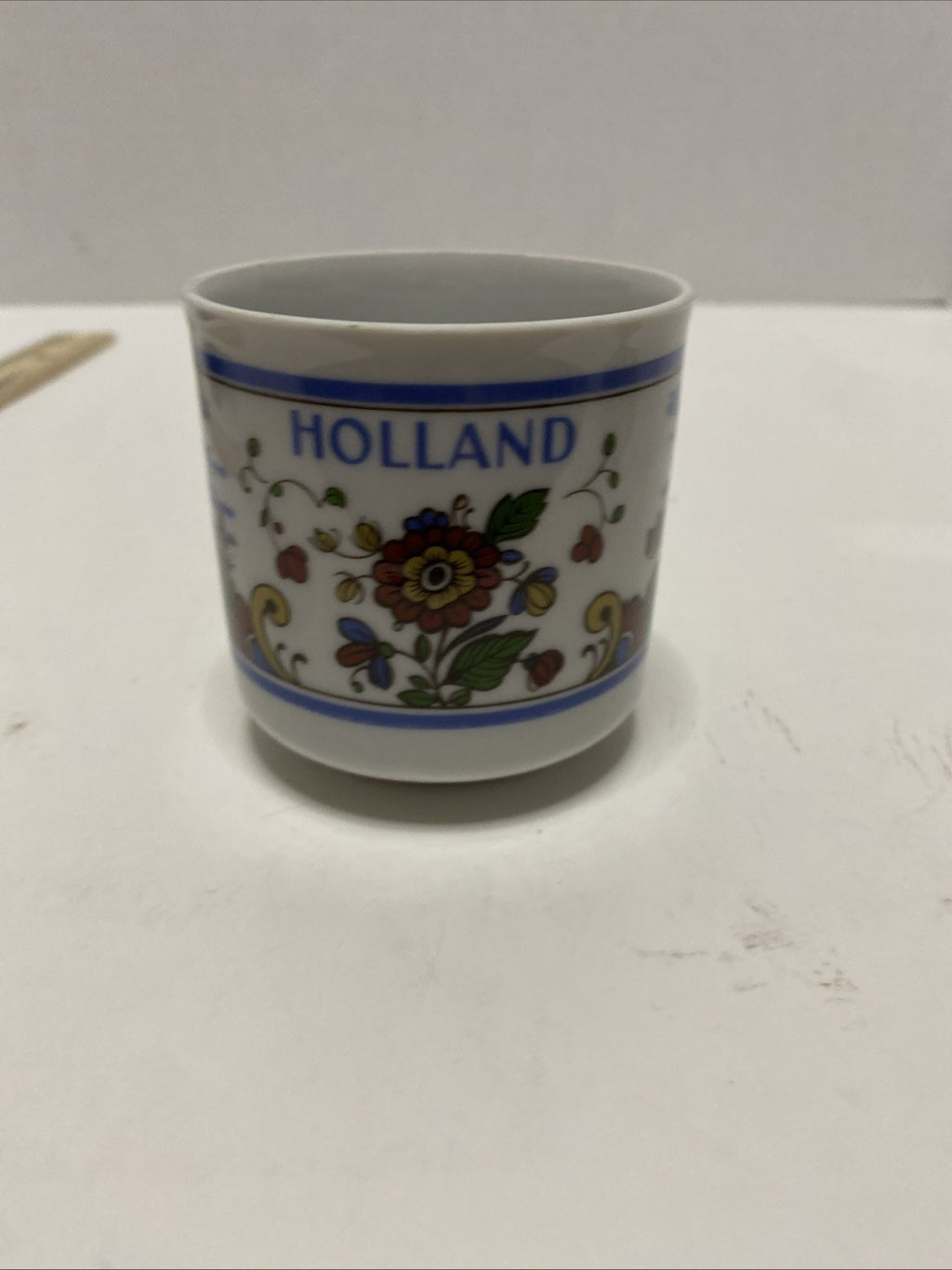 Delft IS colorful hand painted earthenware coffee mug Holland Netherlands 