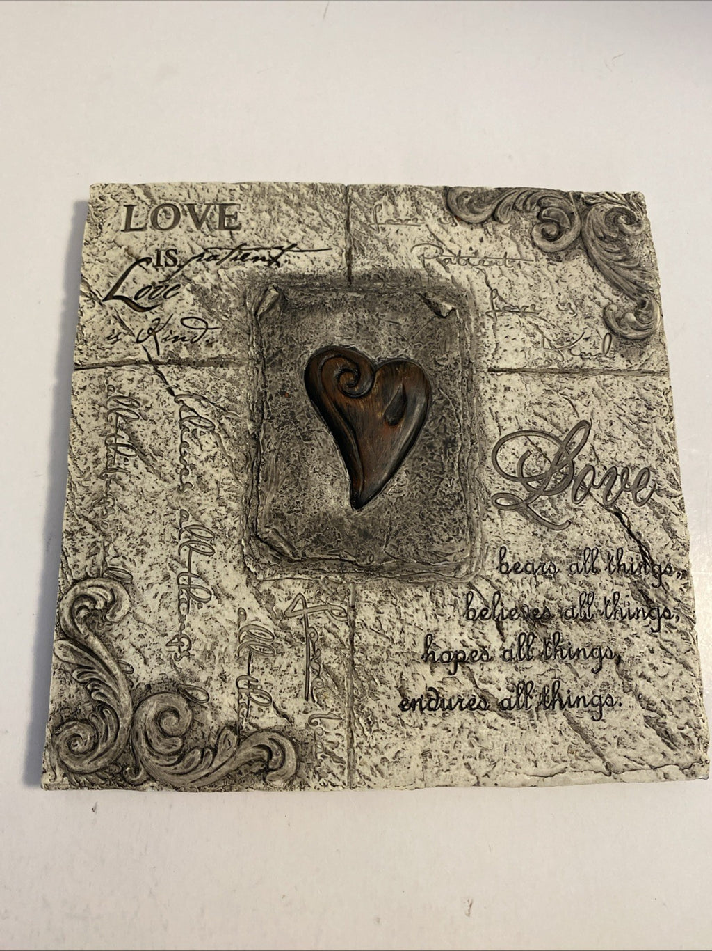 Plaster wall hanging love bears all things white in color 7 x 7”