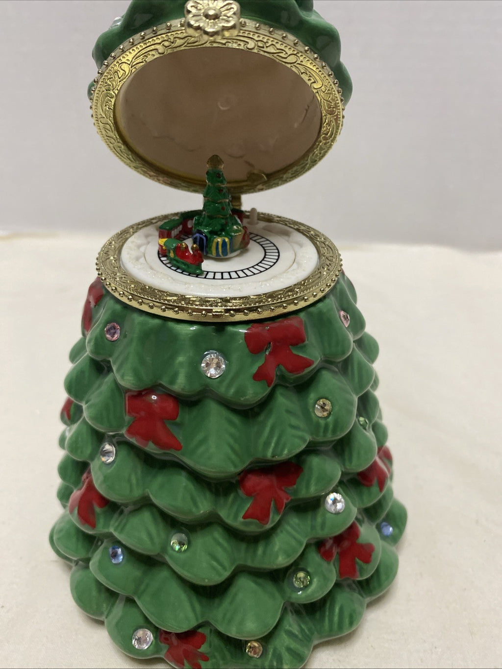 Mr. Christmas Musical Tabletop Ceramic Christmas Tree With Train Inside Top
