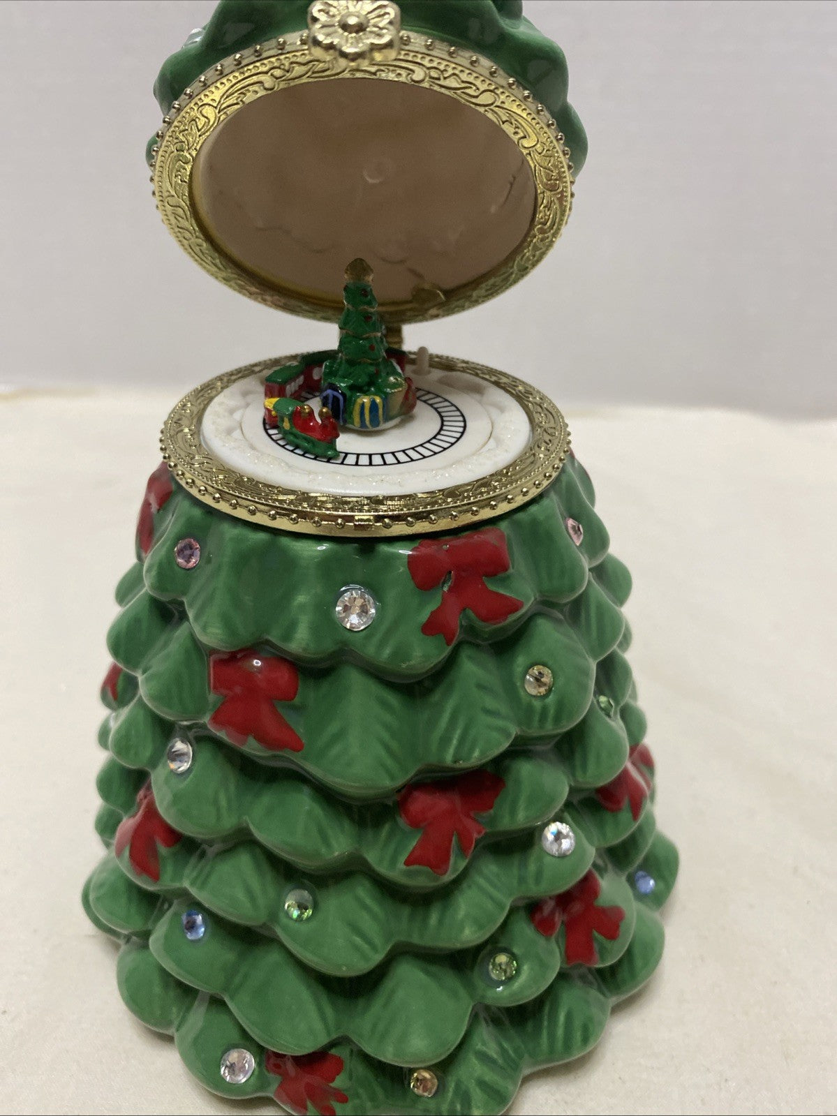 Mr. Christmas Musical Tabletop Ceramic Christmas Tree With Train Inside Top