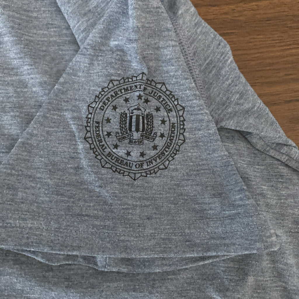 Under Armour small short sleeve shirt FBI logo left sleeve