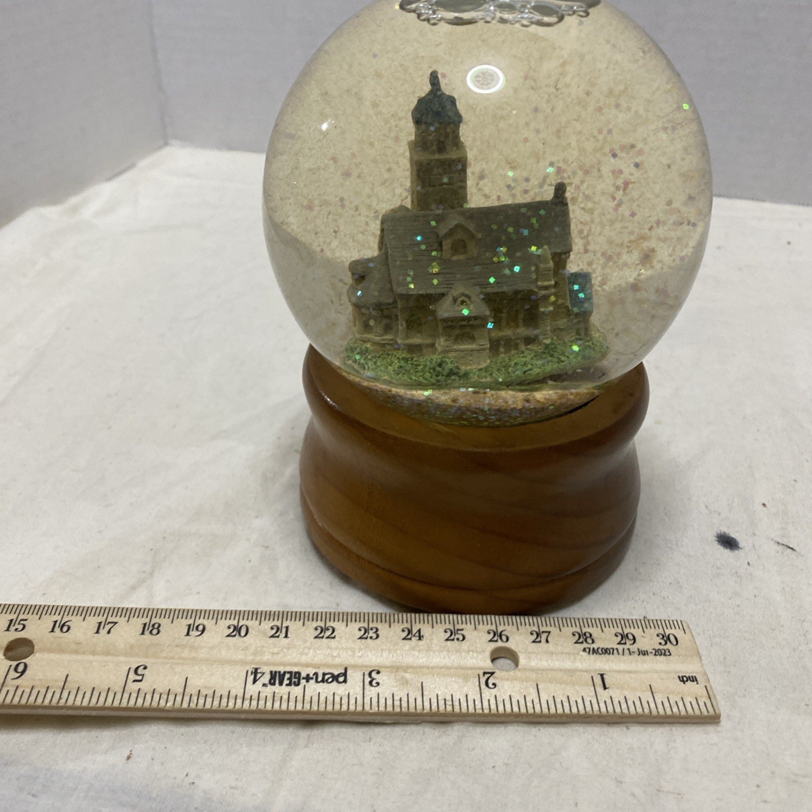 Snow globe Church Plays “Oh Holy Night”