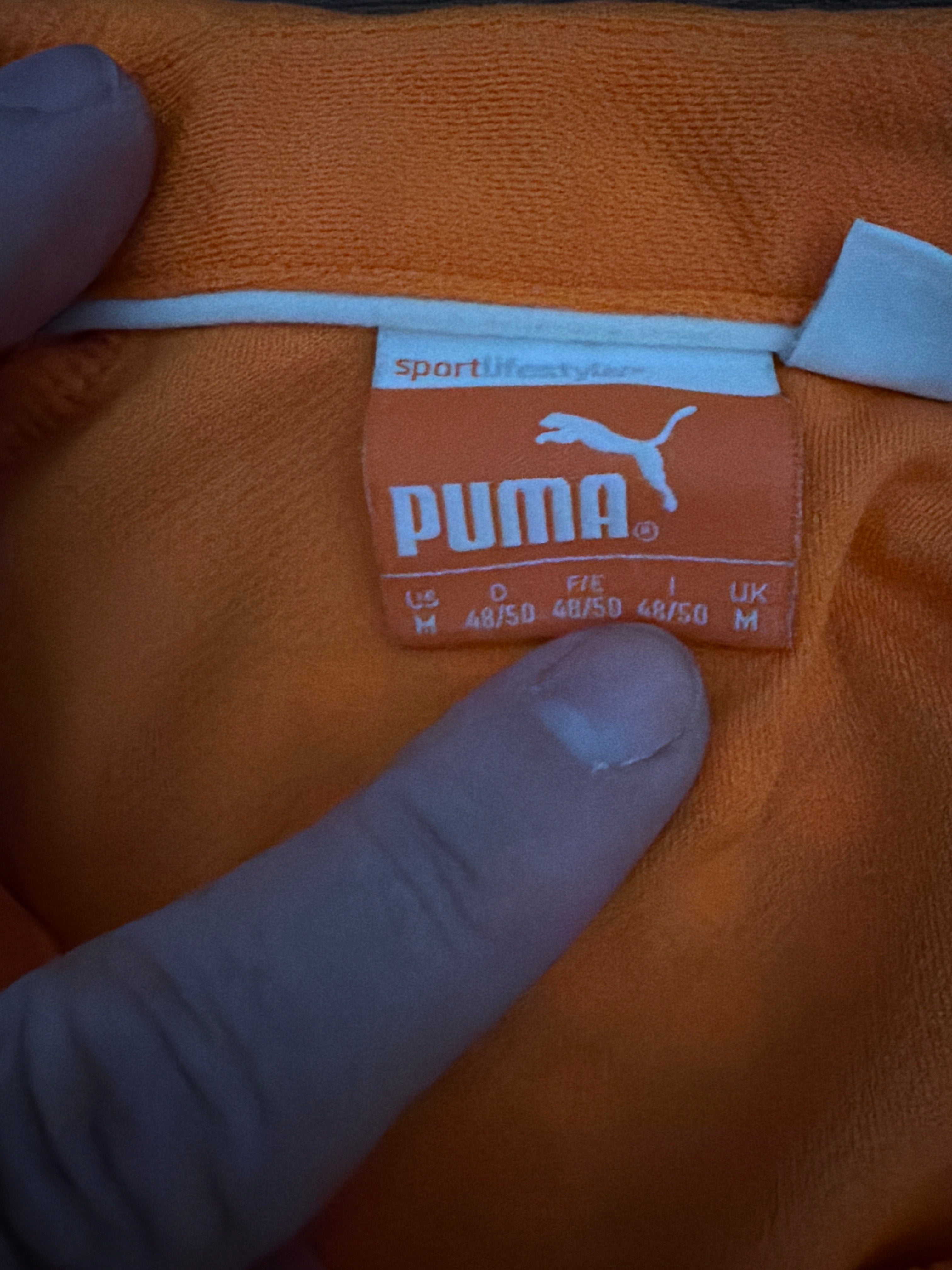 Puma, men’s medium orange golf shirt
